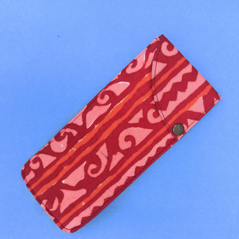 Red multipurpose block printed pouch from Bagru, Rajasthan. 