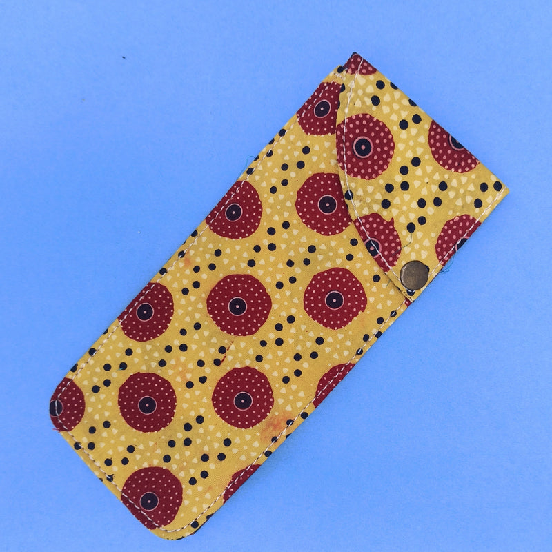 Mustard and red multipurpose block printed pouch from Bagru, Rajasthan. 