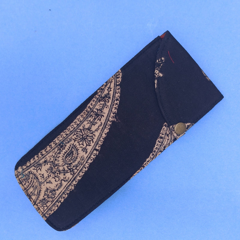 Black multipurpose block printed pouch from Bagru, Rajasthan. 