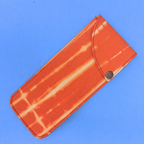Orange multipurpose block printed pouch from Bagru, Rajasthan. 